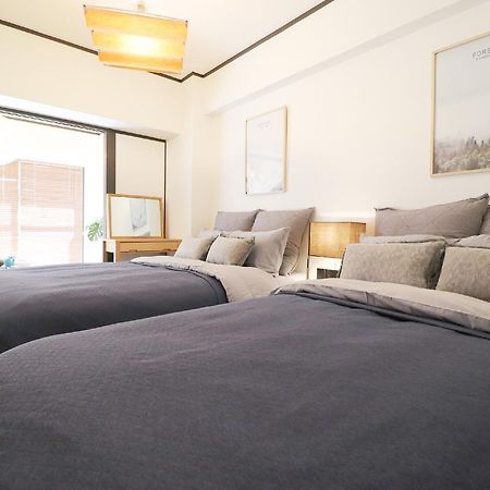 Apartamento Osaka Mainichi Building Exterior foto